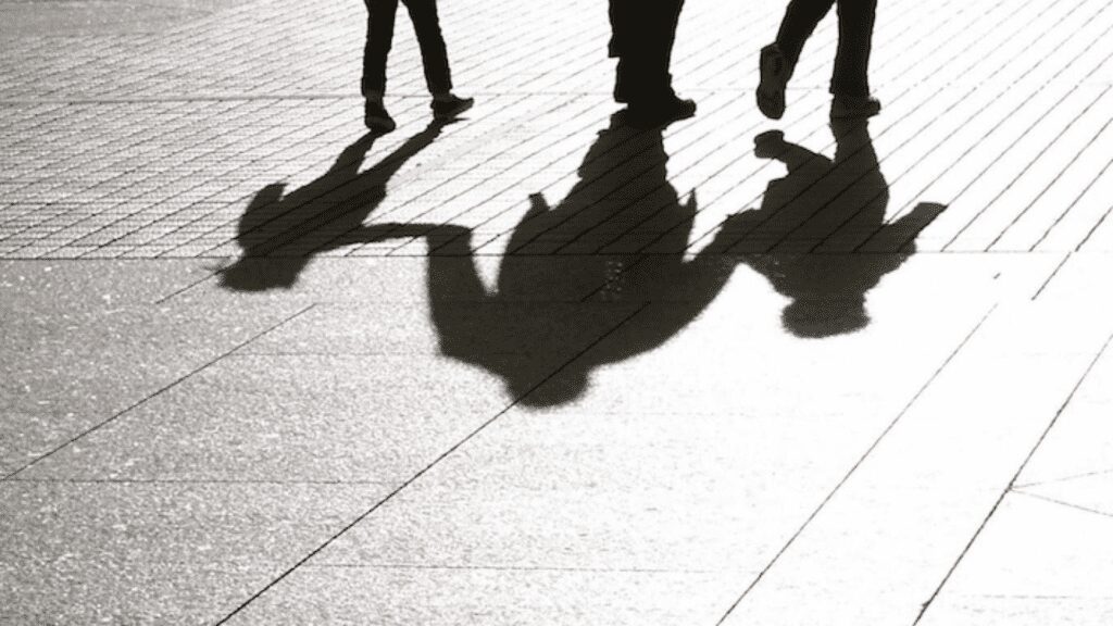 people in shadow